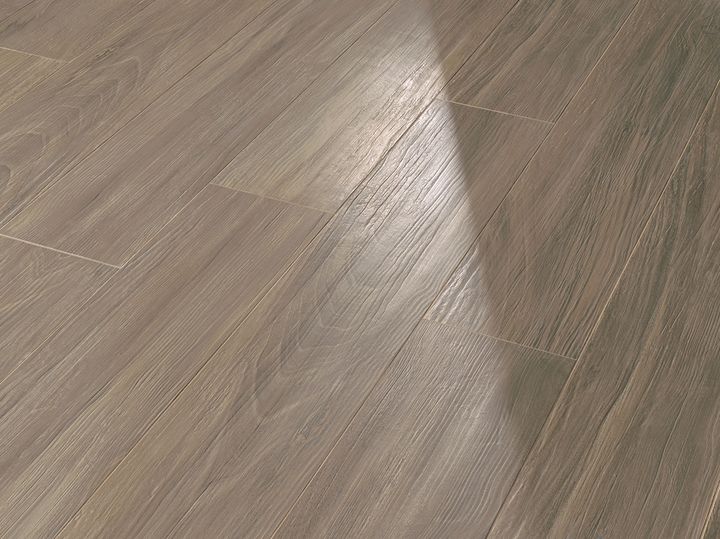 Bruine PVC vloer is geplaatst door Tegelhome & HV Wonen